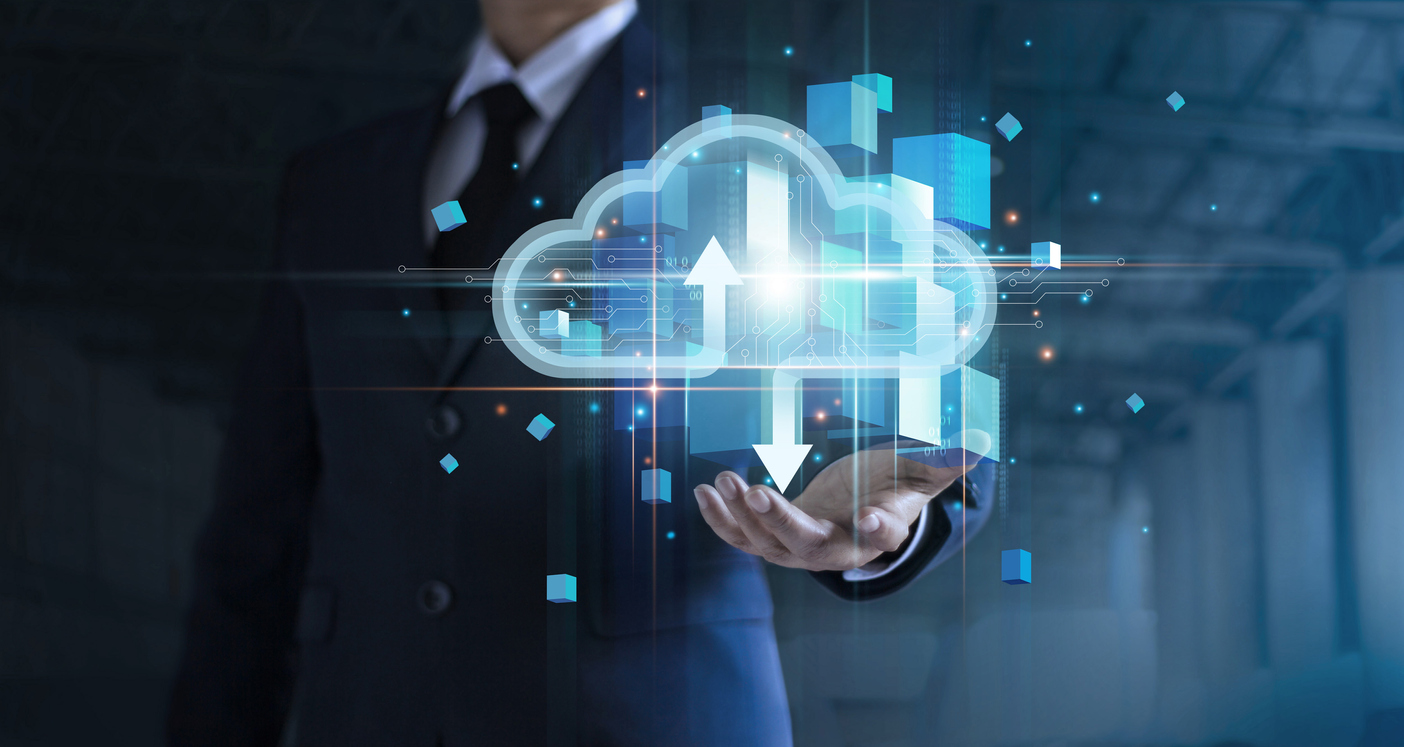 Businessman hand holding cloud computing online connecting to big data analytics. Block chain network technology and intelligence data storage develop smart decision in global business solution.